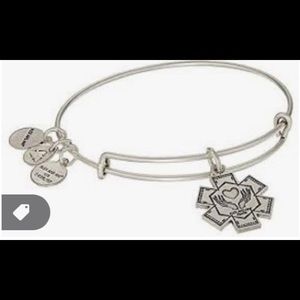 Alex and ani medical professionals bracelet. Never worn. Silver color.